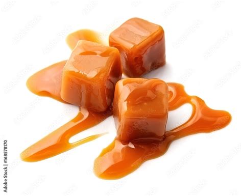 Caramel candies and caramel topping . Stock Photo | Adobe Stock