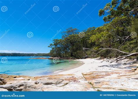 People Enjoying The Sunny Weather At Galamban Green Patch Beach In