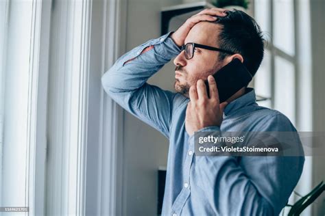 Frustrated Businessman Using Phone High Res Stock Photo Getty Images