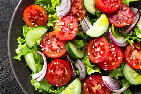 Salad. Fresh Vegetable Salad with Tomato, Cucumber, Lettuce and Red ...