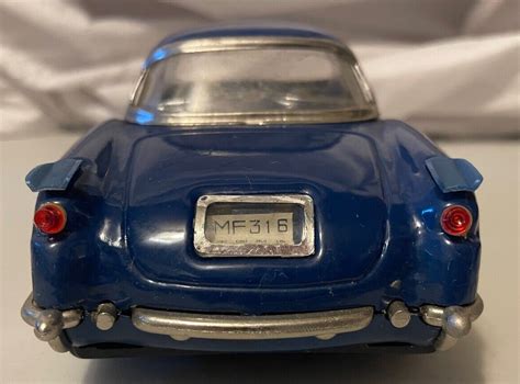 Deluxe MF316B 1950s Chevrolet Corvette Hardtop Tin Friction Car In Blue