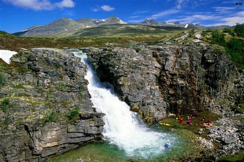 Aerial Photography Of Waterfalls Between Rocks During Daytime Hd