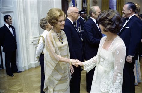 First Lady Betty Ford Shaking Hands With An Unidentified Woman In The