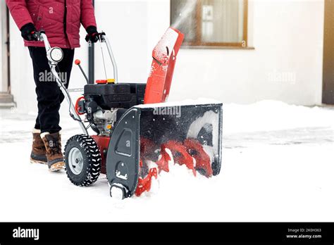 Man Pushing Snow Blower In Deep Snow Hi Res Stock Photography And