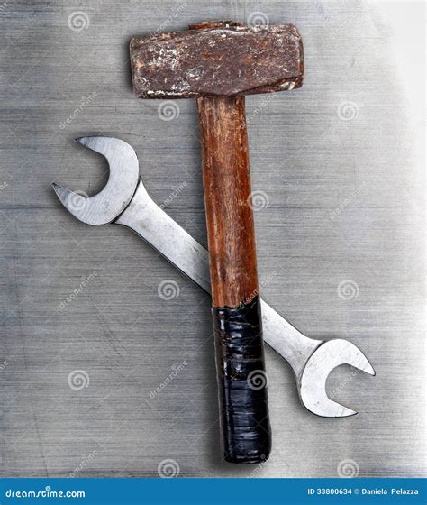 Hammer And Wrench On Metal Stock Photo Image Of Isolated 33800634