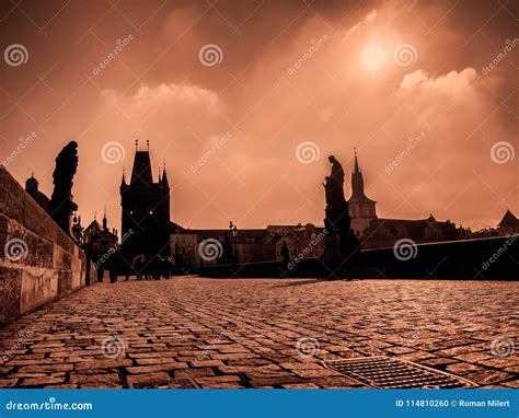 Charles Bridge in Prague at Sunrise Stock Photo - Image of tourists ...