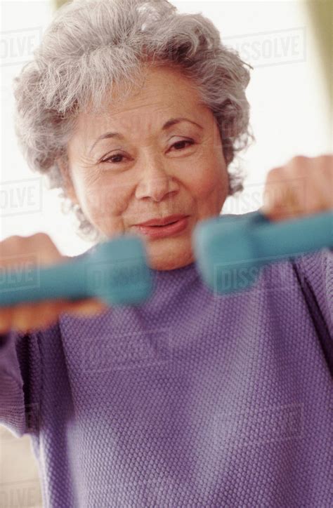 Senior Woman Exercising Stock Photo Dissolve