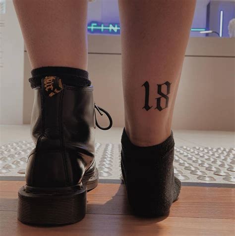 Tattoo Of The Number Located On The Achilles