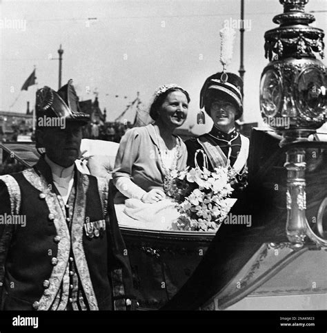 Princess Juliana And Prince Bernhard In Their State Carriage Riding