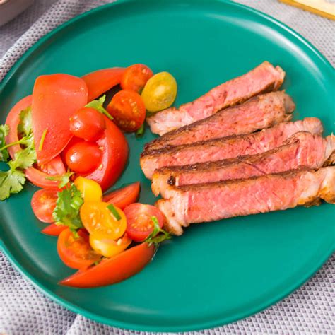 Braai Rubbed Ribeyes With Tomato Salad Basbaas Foods