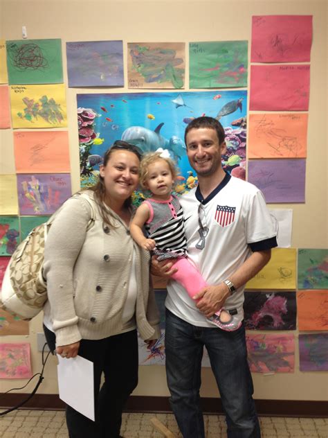 DeCicco family in front of paintings | Lafayette Kids Lab