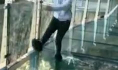 Watch Man Risks Falling To His Death As Glass Bridge Shatters Below Travel News Travel