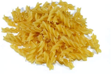 Pile Of Dry Raw Uncooked Macaroni Dry Pasta Shaped Like Fusilli Made