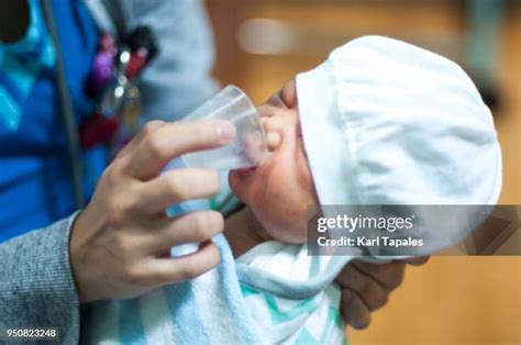 Cup Feeding Baby Photos And Premium High Res Pictures Getty Images