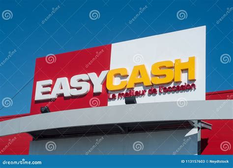 Easy Cash Logo On Store Front On Blue Sky Background Easy Cash Is The