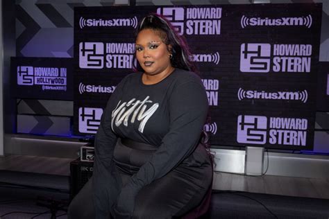 Lizzo Sports ‘yitty Top With Combat Boots For ‘the Howard Stern Show