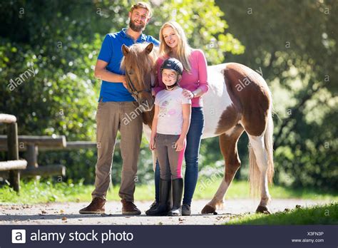 Man Standing Next Horse Stock Photos And Man Standing Next Horse Stock