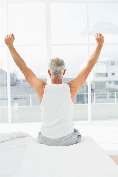 Rear View Mature Man Stretching Arms Bed Stock Photos Free Royalty