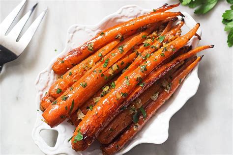 Honey Garlic Butter Roasted Carrots Recipe Eatwell101