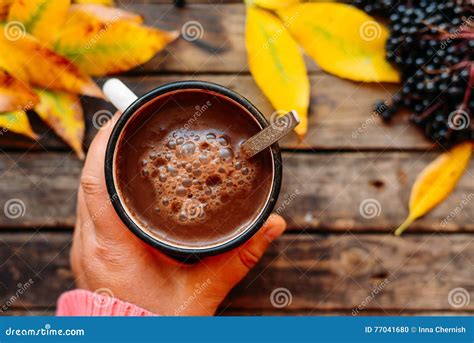 Woman Holding Cup Of Hot Chocolate Hot Chocolate In Wooden Tabl Stock Photo Image Of Cocoa