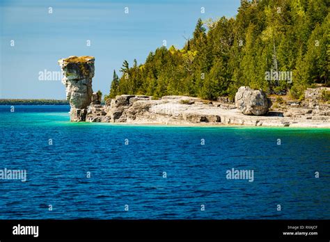 Large 'flowerpot' (sea stack) as seen from the water, Flowerpot Island ...