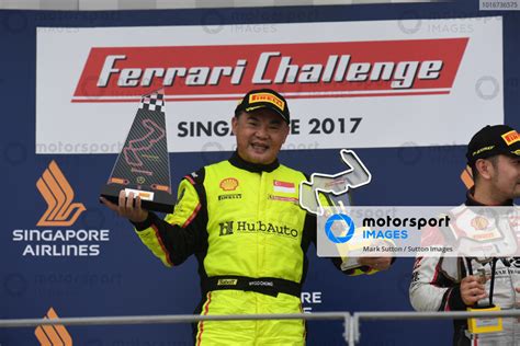 Race Winner Ringo Chong Sin Celebrates On The Podium With The