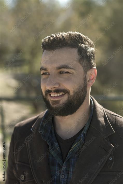 Beared 35 Years Old Man Portrait In Outdoors Image With Full Beard And