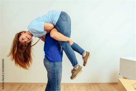 Guy Carrying Girlfriend Over Shoulder