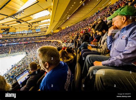 Spectators Watching Ice Hockey Game At Madison Square Garden Manhattan