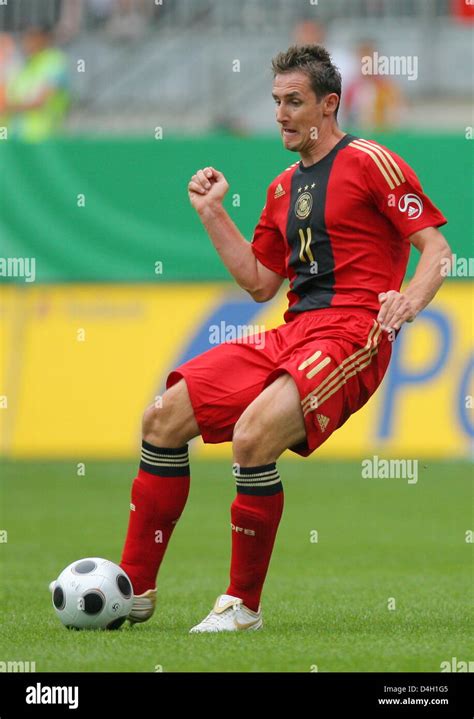 German International Striker Miroslav Klose Controls The Ball In The