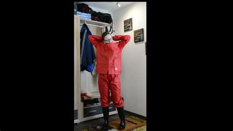 Solo Woman Lady Nadja Layers Herself In Rainwear During Self Bondage