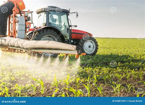 Tractor Spraying Pesticides Stock Photo Image Of Dust Material