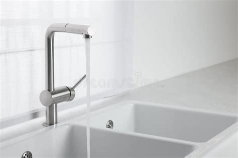 Stream Of Water Flowing From Tap In Kitchen Stock Image Image Of