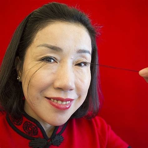 Woman with the world's longest eyelashes breaks her own record with 8 ...