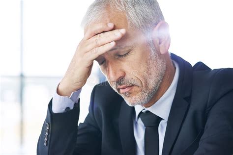 Hes Facing A Tough Challenge A Mature Businessman Looking Stressed Out