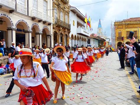 Group Of Girls Dancers Cuencanas At The Parade At The Historic Center