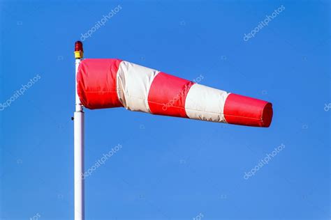 Airport windsock on blue sky — Stock Photo © EM_prize #117628416