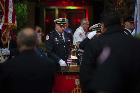 Members Of The Chicago Fire Department Gather For A Moment Of Silence