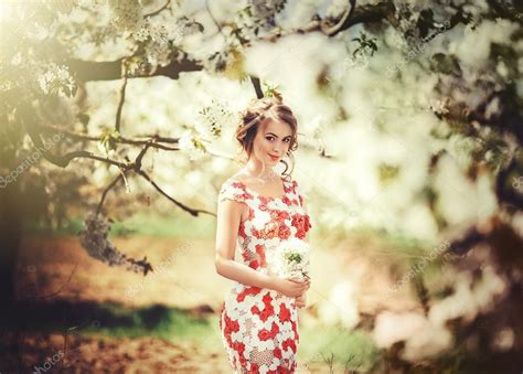 woman posing  spring garden stock photo  forewer