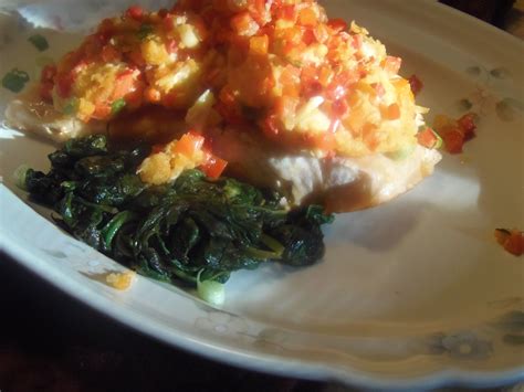 Blue Crab Crusted Salmon With Melted Spinach And Lemon Salmon Fillets Are Seared Then Baked In