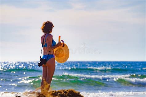 Woman In Bikini With Camera Walk On Beach Stock Image Image Of Suntan