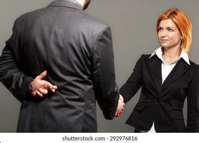 Shaking Hands Fingers Crossed Royalty Free Images Stock Photos