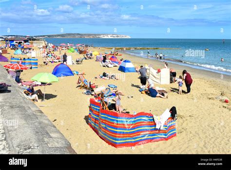 Busy sandy UK English summer holiday beach at Shanklin on the Isle of ...