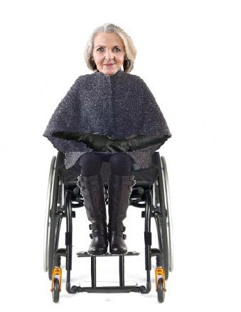 Caped Mature Lady Wheels Of Fire Paraplegic Wheelchairs Lady