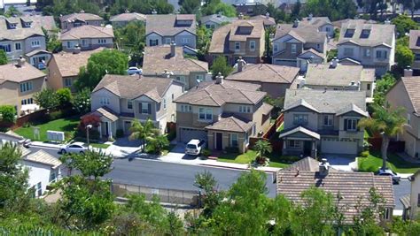 A High Angle View Of New Suburban Homes On A Residential Street In The