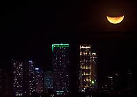 Manila Philippines Large Crest Moon Half Moon Over Buildings In