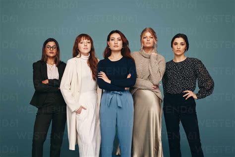 Five Women Of Different Ages Standing Together In A Studio Diverse