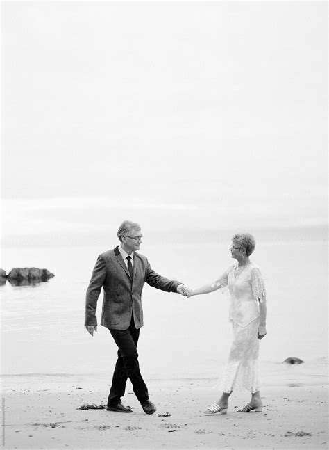 Senior Couple At The Beach By Stocksy Contributor Adrian Balzer