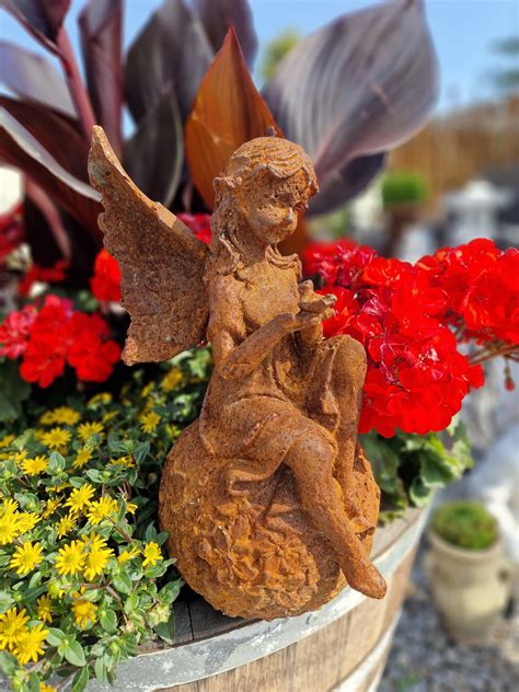 Cast Iron Garden Statue Fairy On Ball Etsy