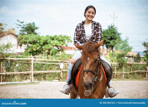 Beautiful Cowboy Girl Riding a Horse while Going Stock Photo - Image of ...